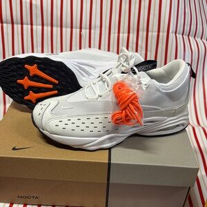 Nike NoctaWhite and Orange Sneakers women’s 9 or men’s 7.5